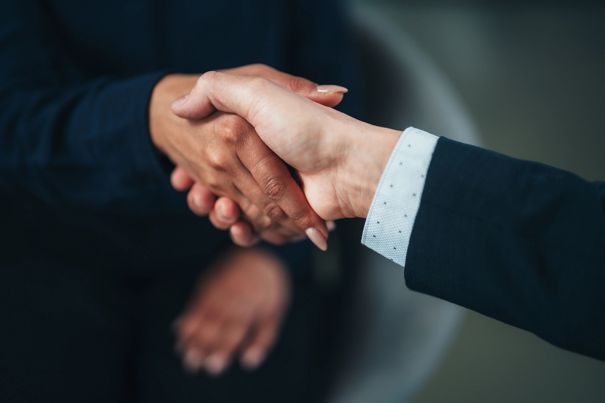 Handshake representing a trusted business partnership